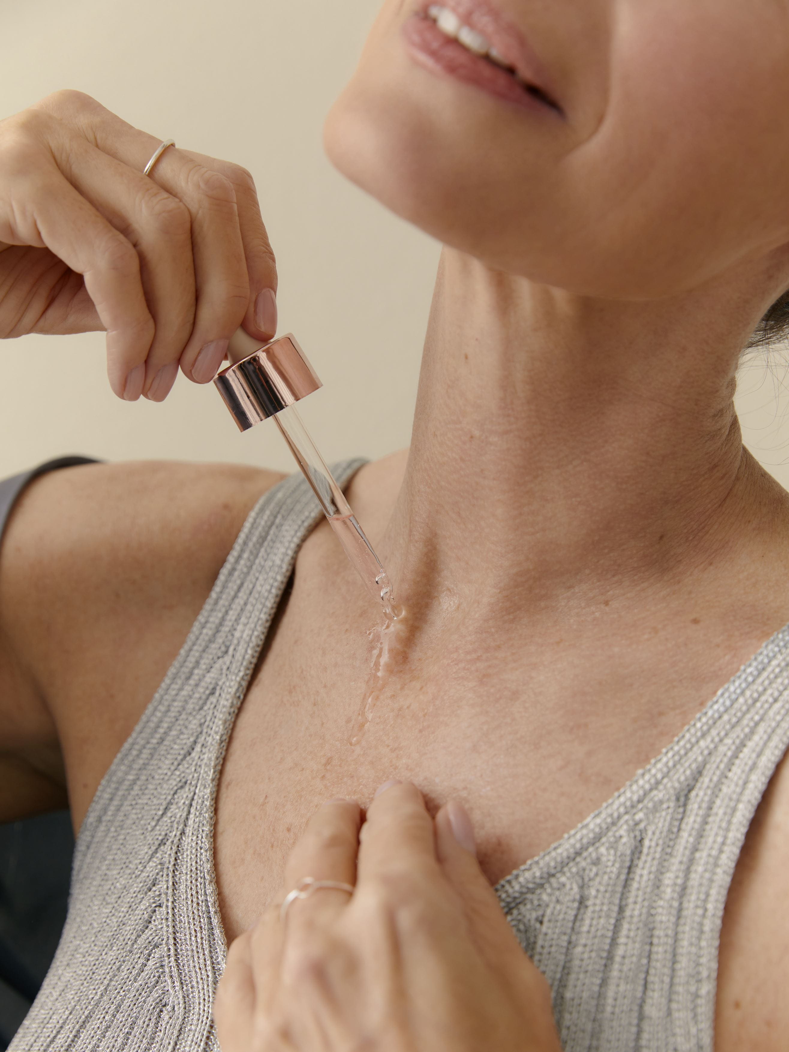 woman applying Nivea serum